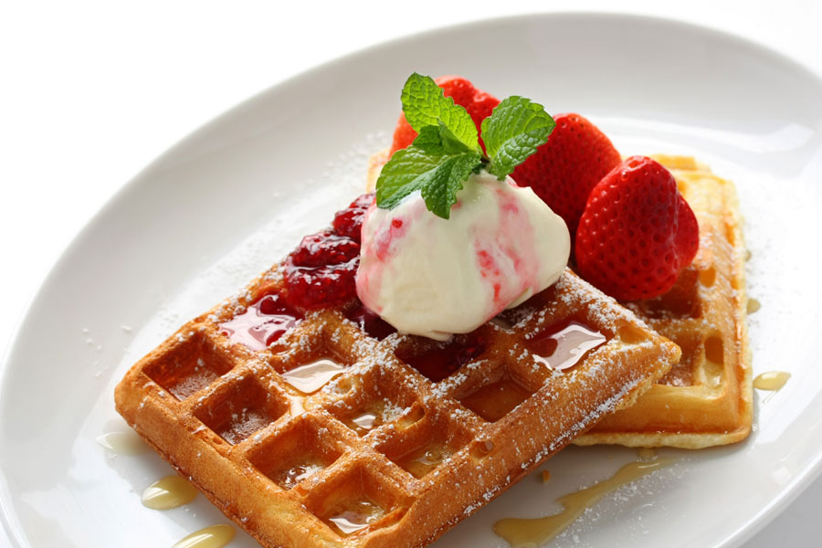 Sweet-waffle-with-jam-strawberries-and-icecream